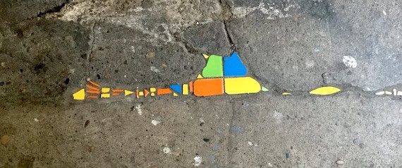 Street art Lyon - réparation et embellissement de chaussée, par Ememem - Street art Lyon 