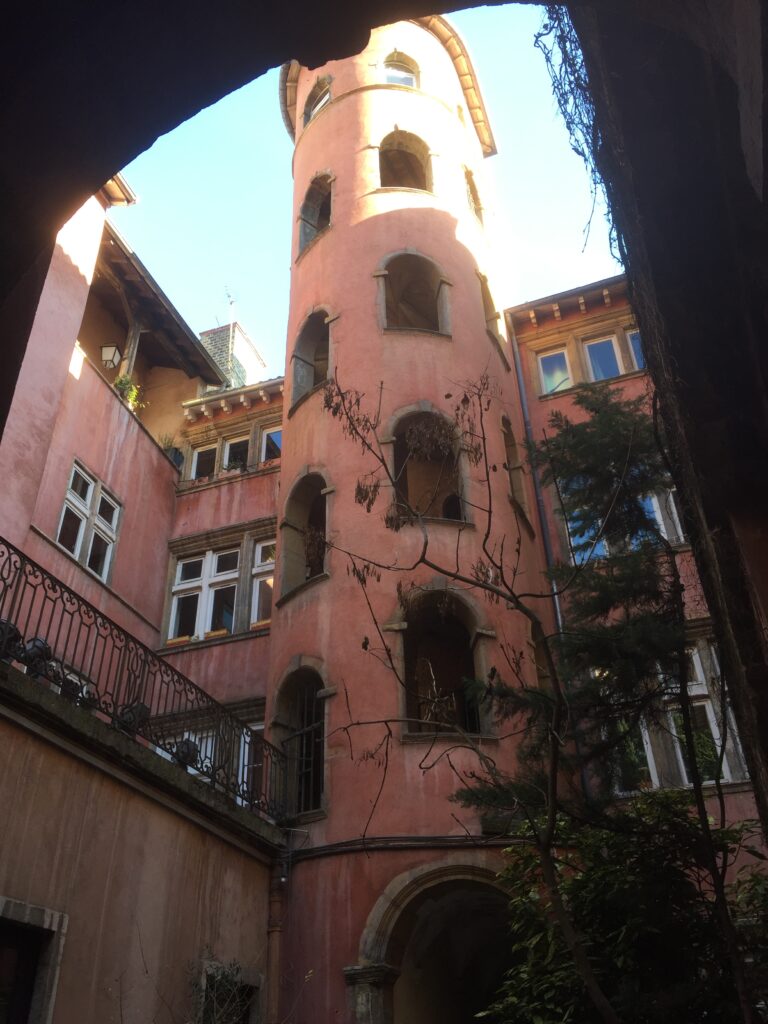 Renaissance pink tower in Old Lyon town at Maison du Crible